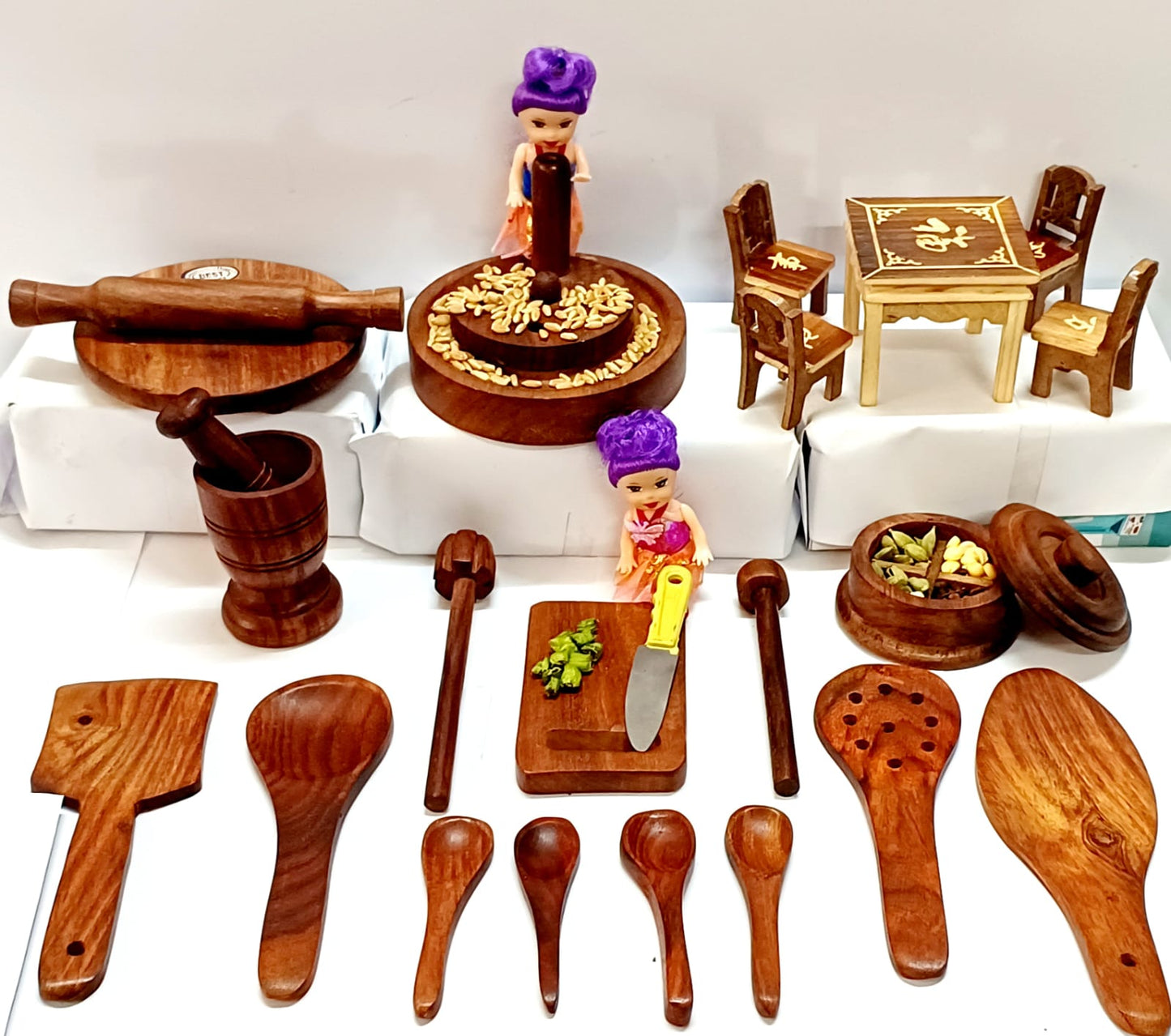 Wooden Pure sheesham Miniarure Combo No 4: Chopping board , chakki , masala box, okhali ,chakla belan, table chair set and spoons